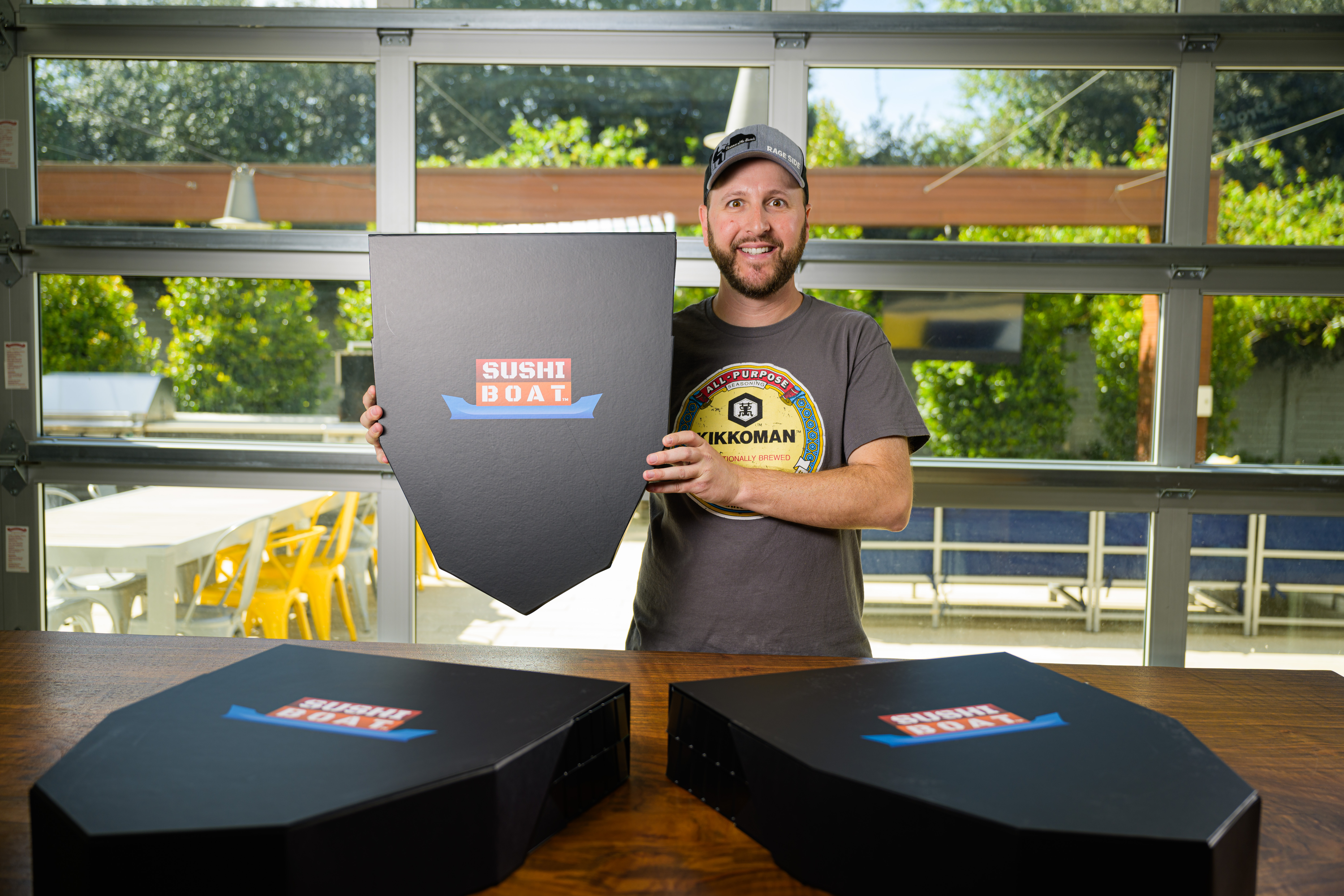 Jon Burns with branded delivery boxes