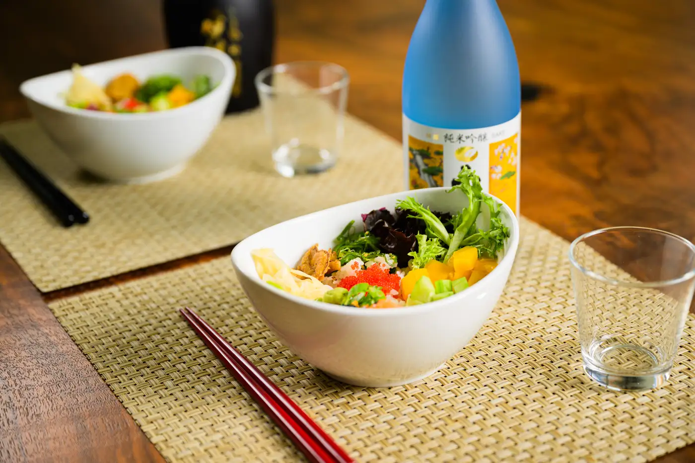 Poke bowls with sake bottle
